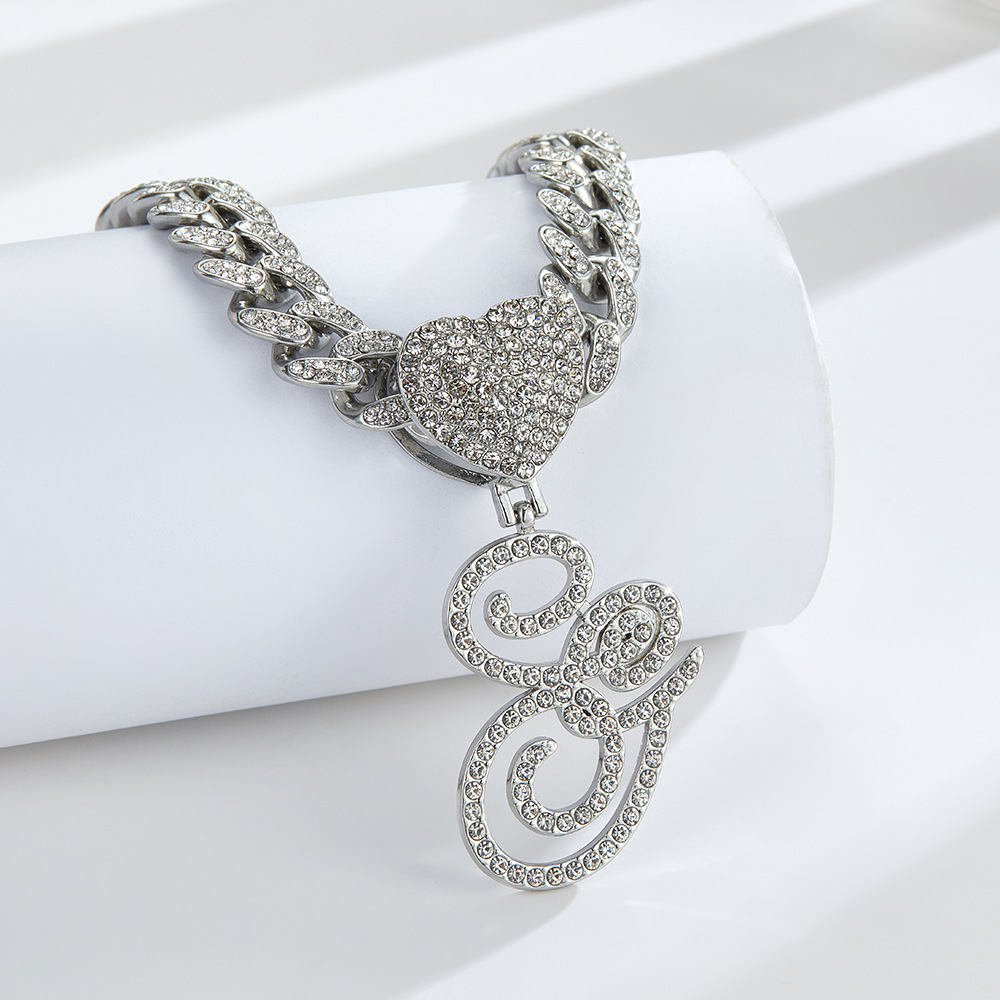 Cursive Diamond Accented Initial Cuban Heart Necklace in silver