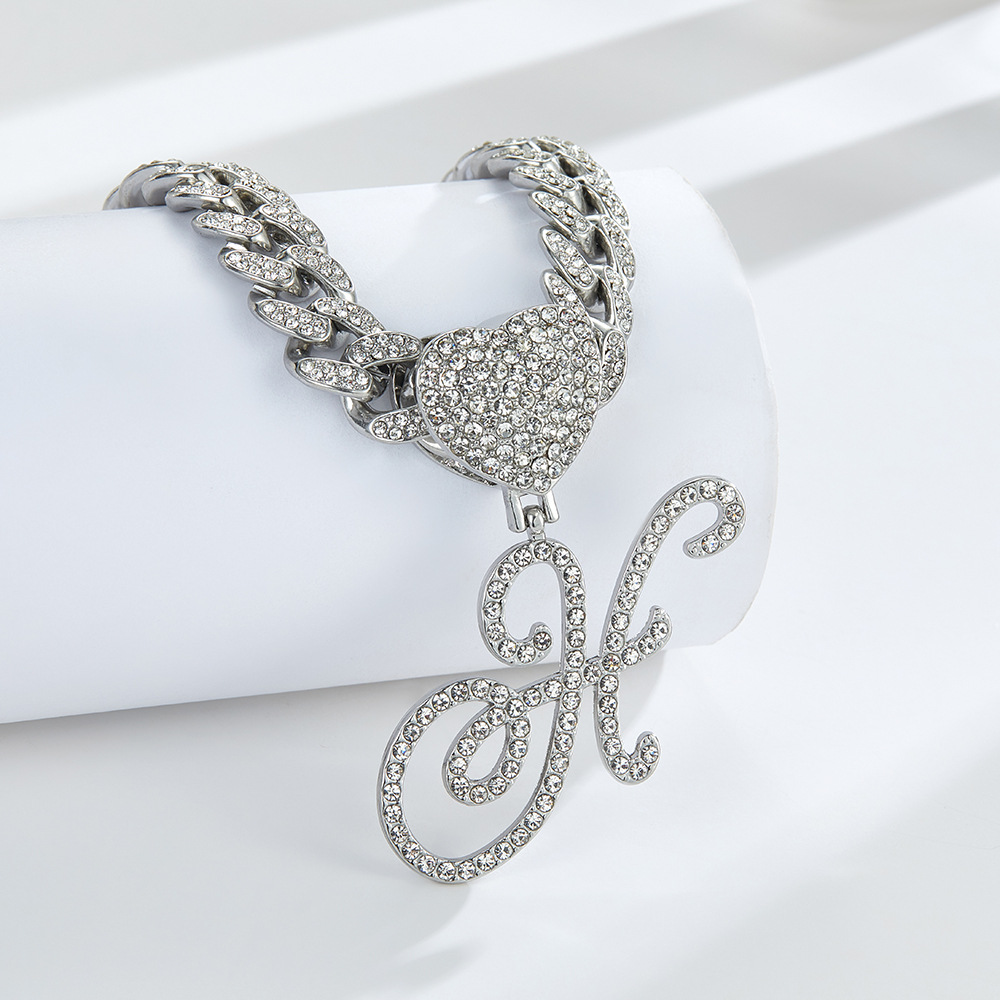 Cursive Diamond Accented Initial Cuban Heart Necklace in silver