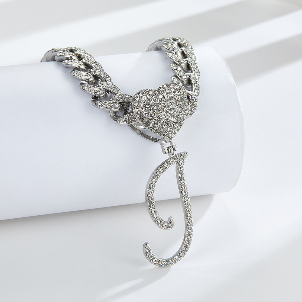Cursive Diamond Accented Initial Cuban Heart Necklace in silver