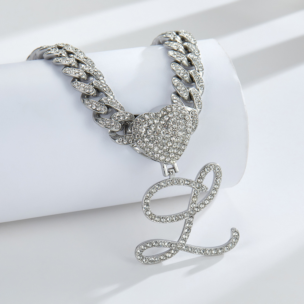 Cursive Diamond Accented Initial Cuban Heart Necklace in silver
