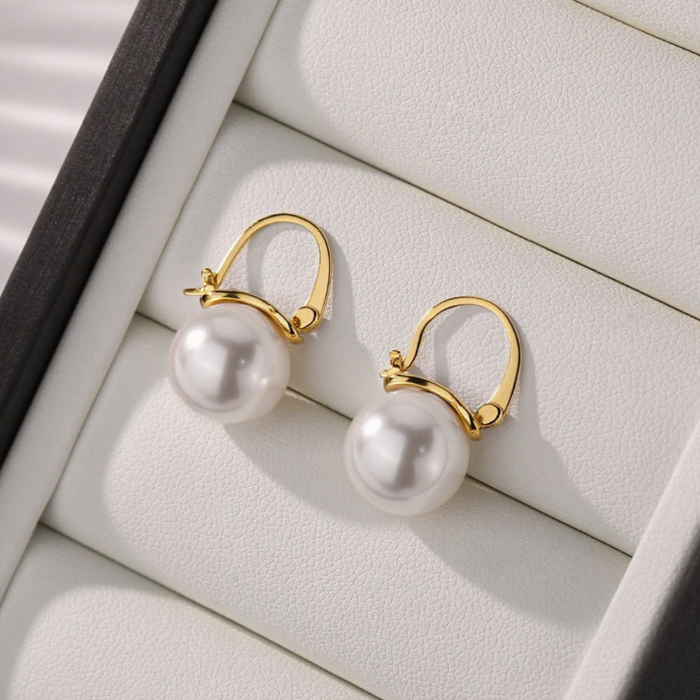 Elegant Pearl Drop Earrings in gold