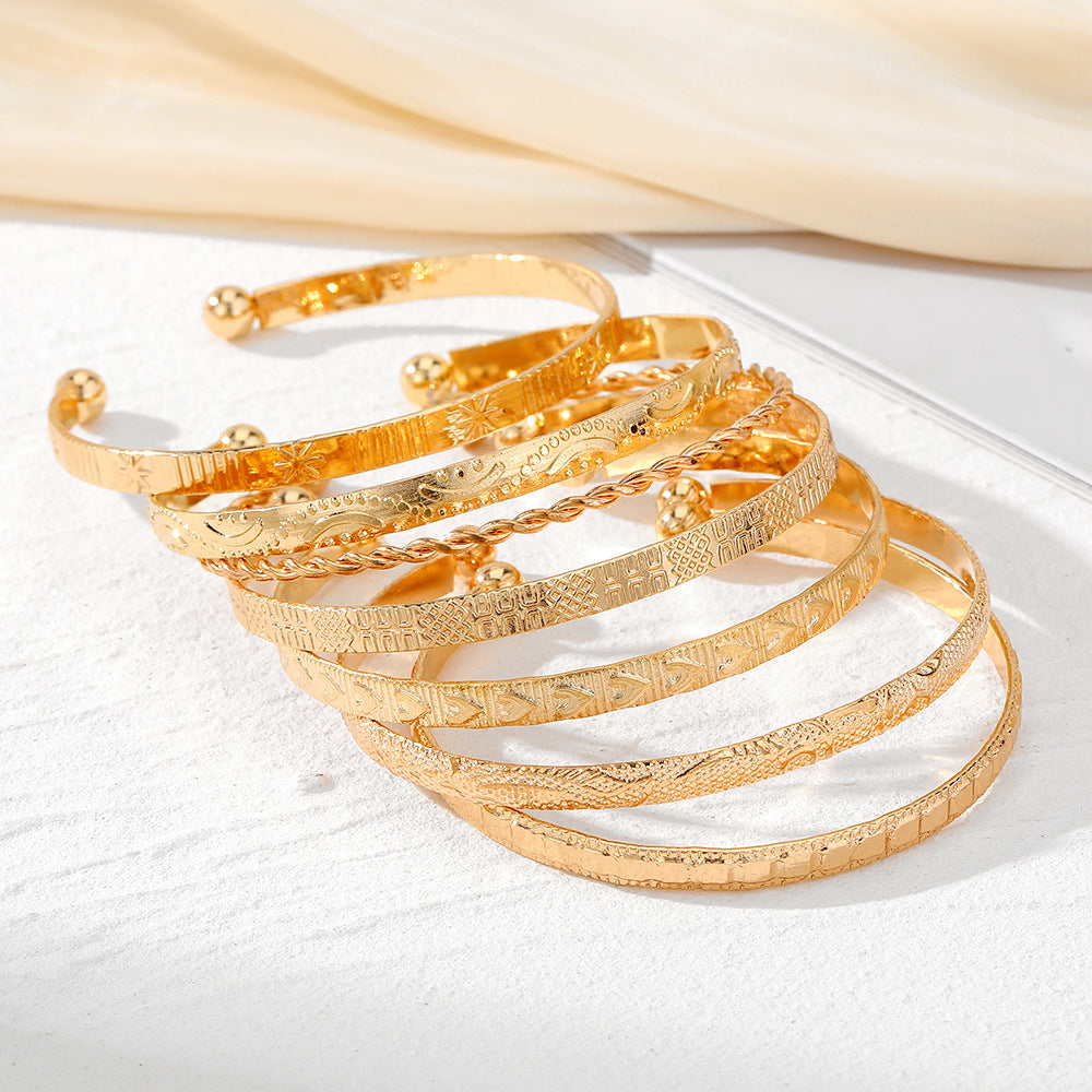 8pc Floral Accented Adjustable Textured Cuff Stack