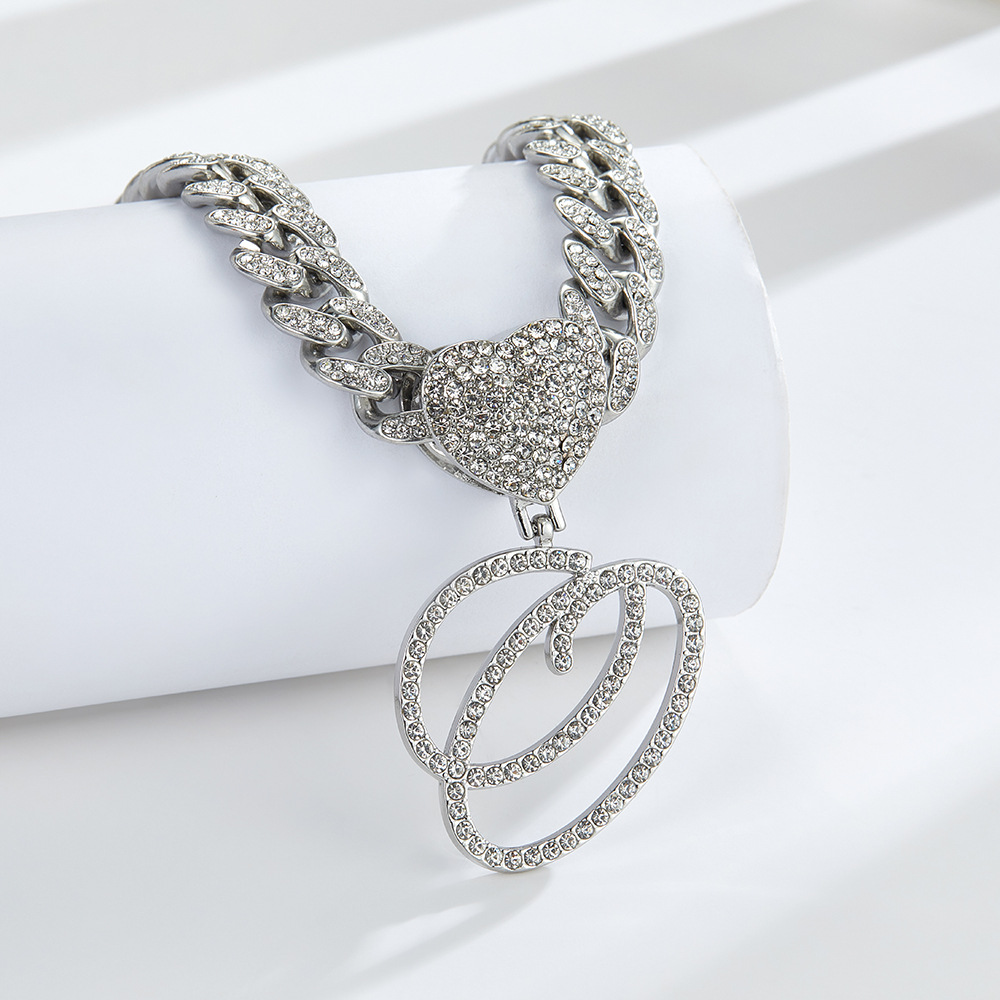 Cursive Diamond Accented Initial Cuban Heart Necklace in silver