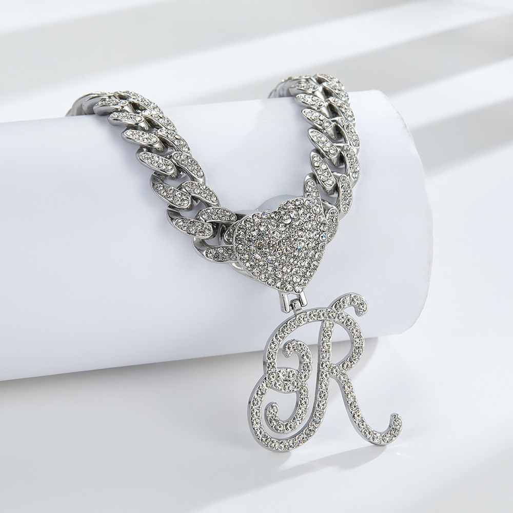 Cursive Diamond Accented Initial Cuban Heart Necklace in silver