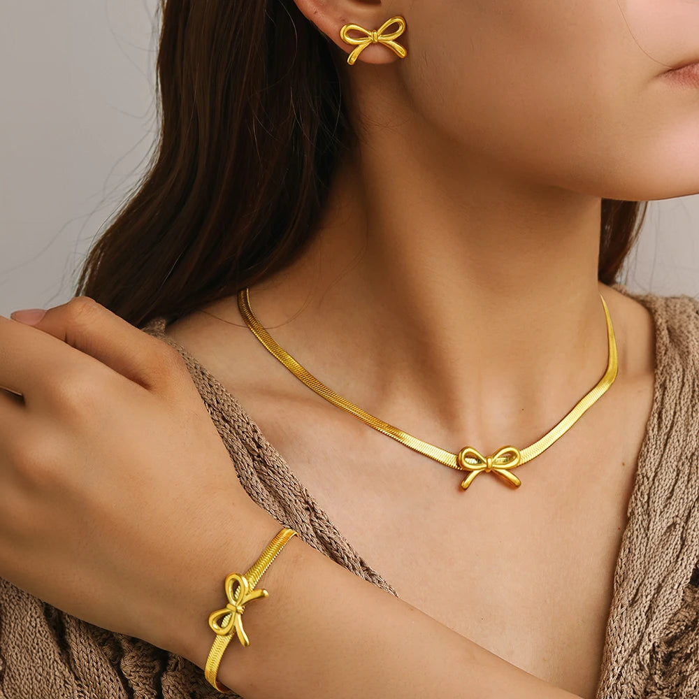Feminine Bow Herringbone Chain Necklace, Bracelet, and Earring Set in gold