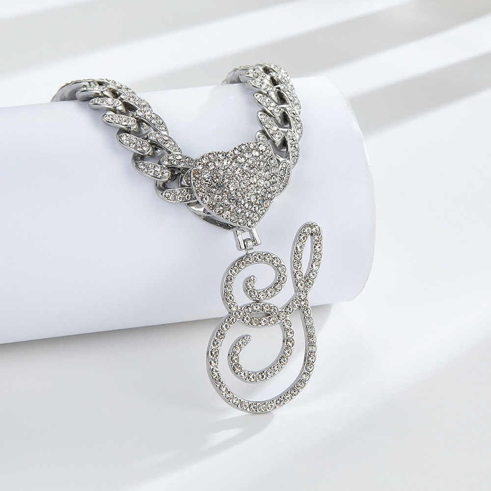 Cursive Diamond Accented Initial Cuban Heart Necklace in silver
