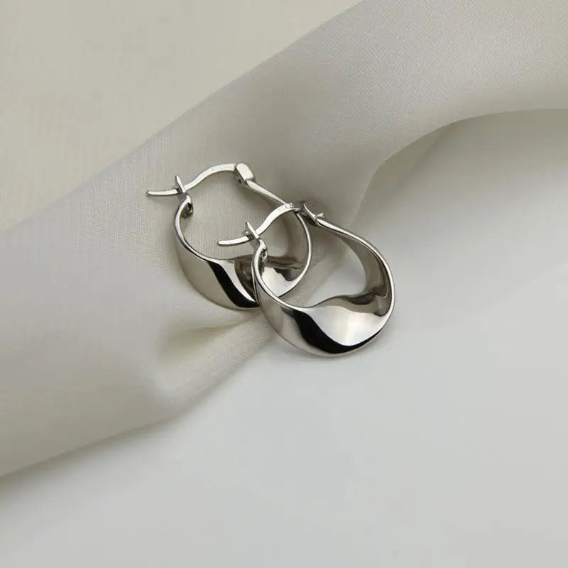 Minimal Flattened Irregular Hoop Earrings in silver
