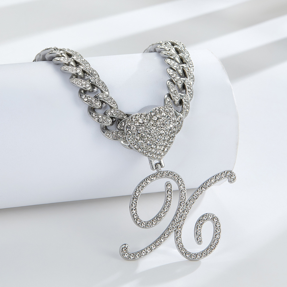 Cursive Diamond Accented Initial Cuban Heart Necklace in silver