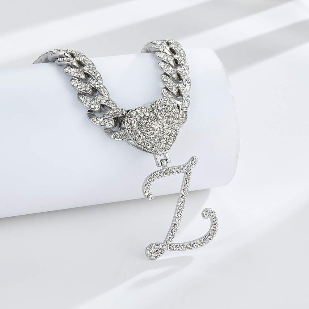 cursive diamond accented initial cuban heart necklace