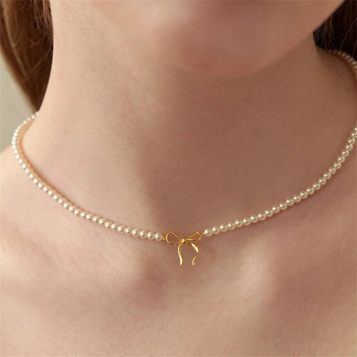 Dainty Beaded Pearl Bow Feminine Choker Necklace in gold