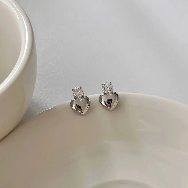 Dainty Diamond Heart Stud Earrings in silver