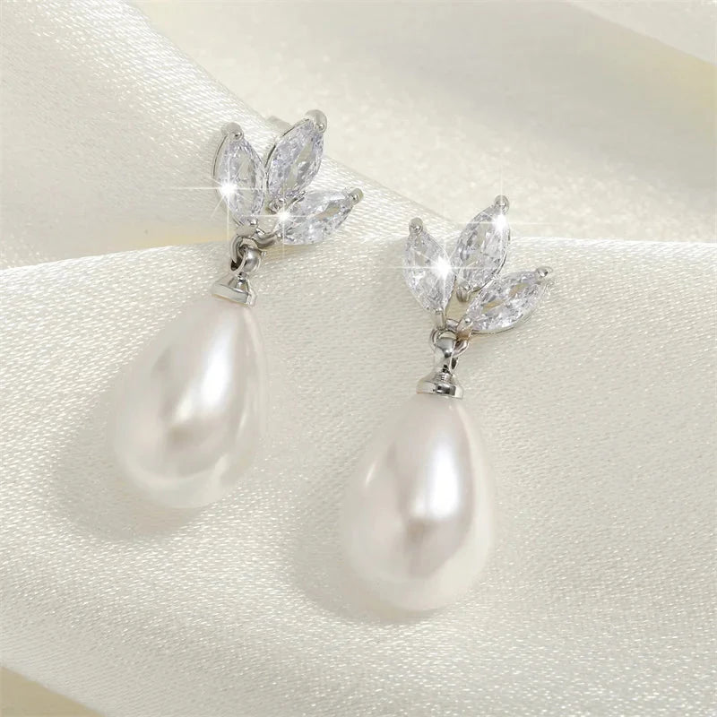 Dainty Diamond Leaf Pearl Earrings in silver