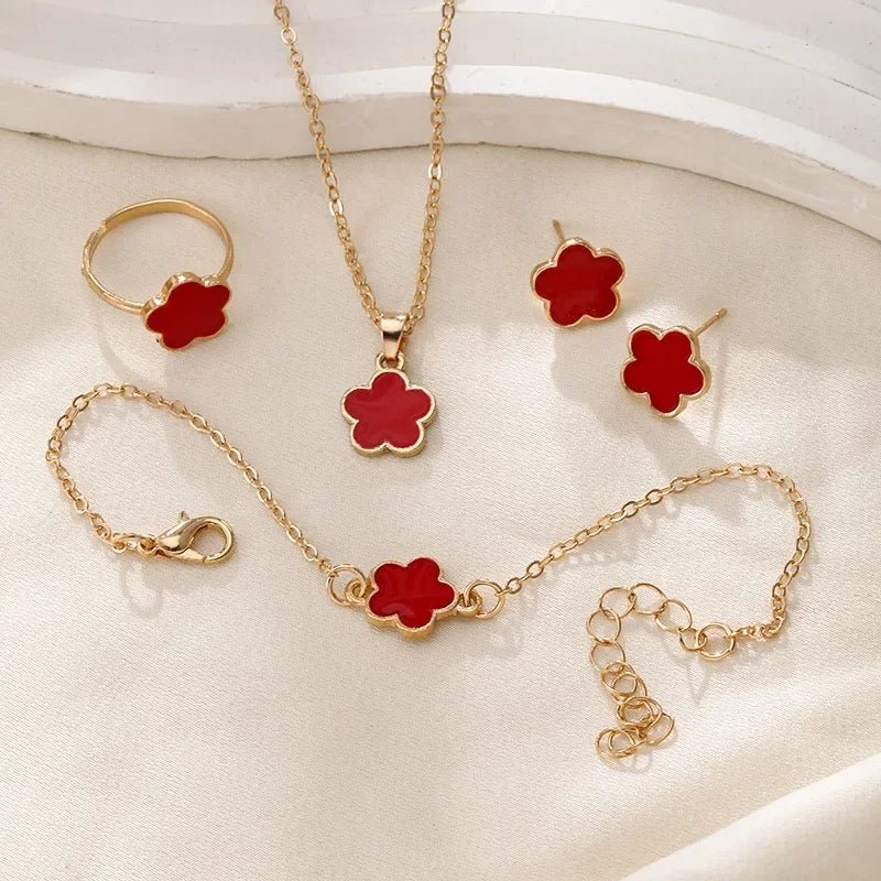 Dainty Lucky Floral Clover Necklace, Bracelet, Earrings, and Rings Set in red