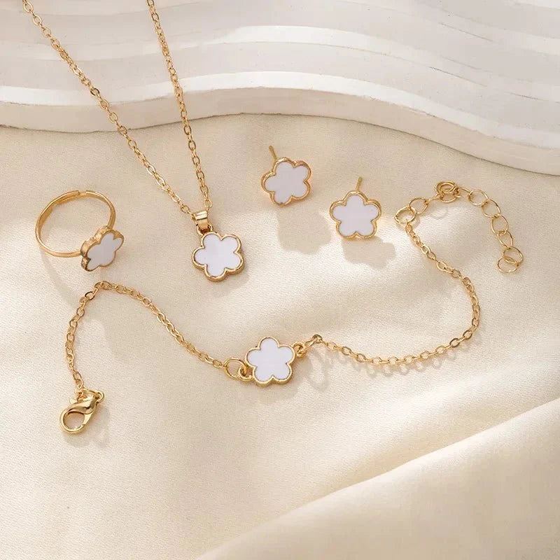 Dainty Lucky Floral Clover Necklace, Bracelet, Earrings, and Rings Set in white