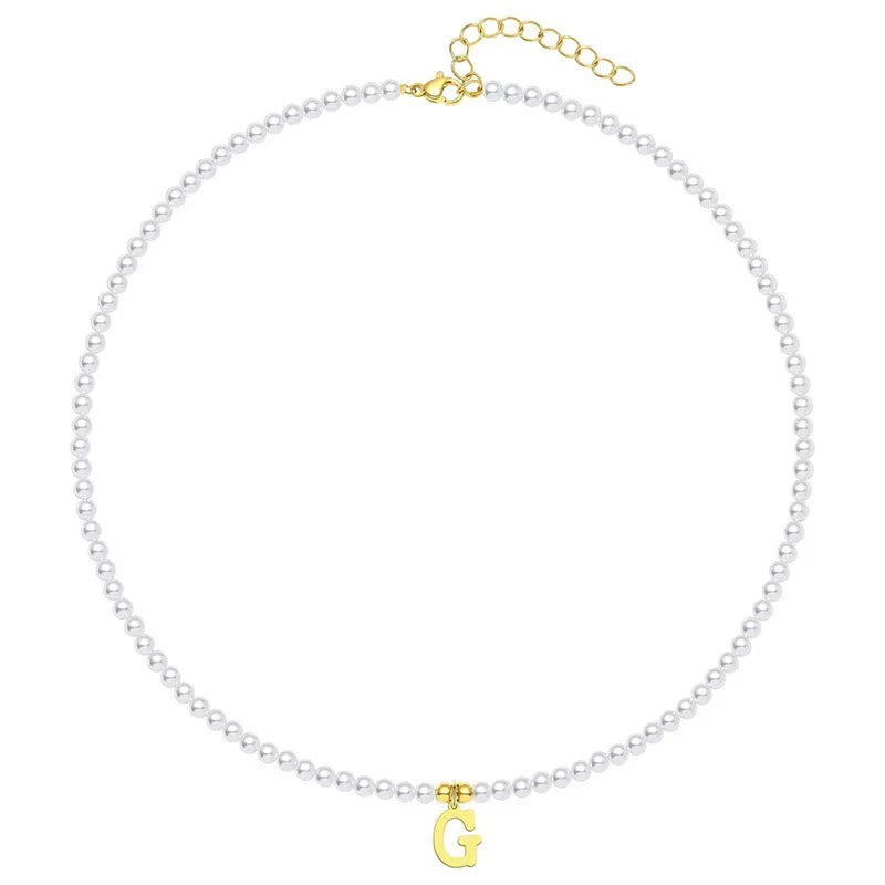 elegant gold accented pearl letter initial necklace