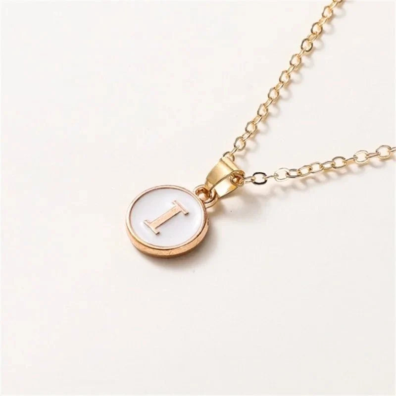 gold accented circle letter initial necklace