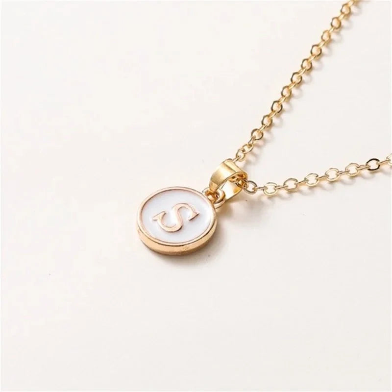 gold accented circle letter initial necklace