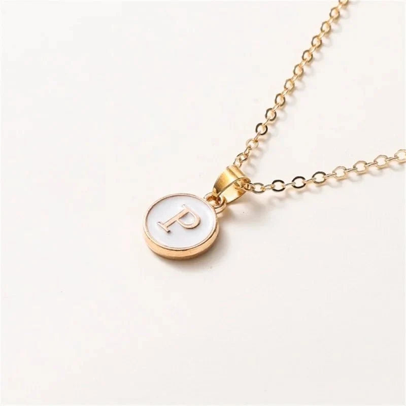 gold accented circle letter initial necklace
