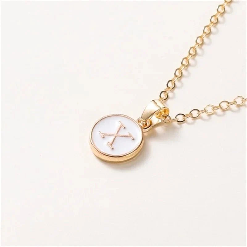 gold accented circle letter initial necklace