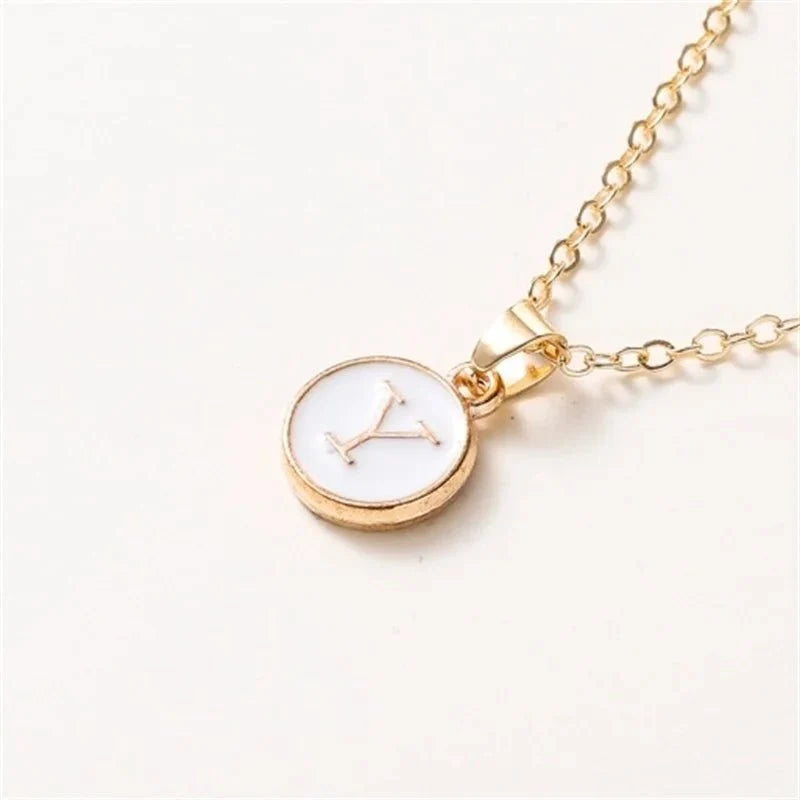 gold accented circle letter initial necklace