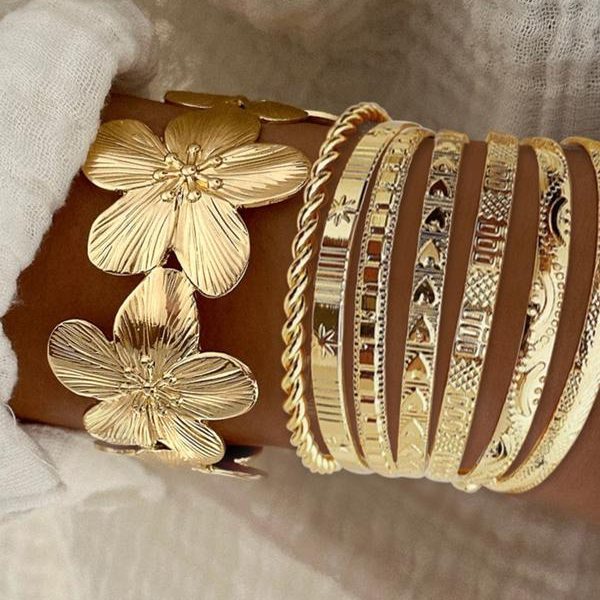 8pc Floral Accented Adjustable Textured Cuff Stack in gold