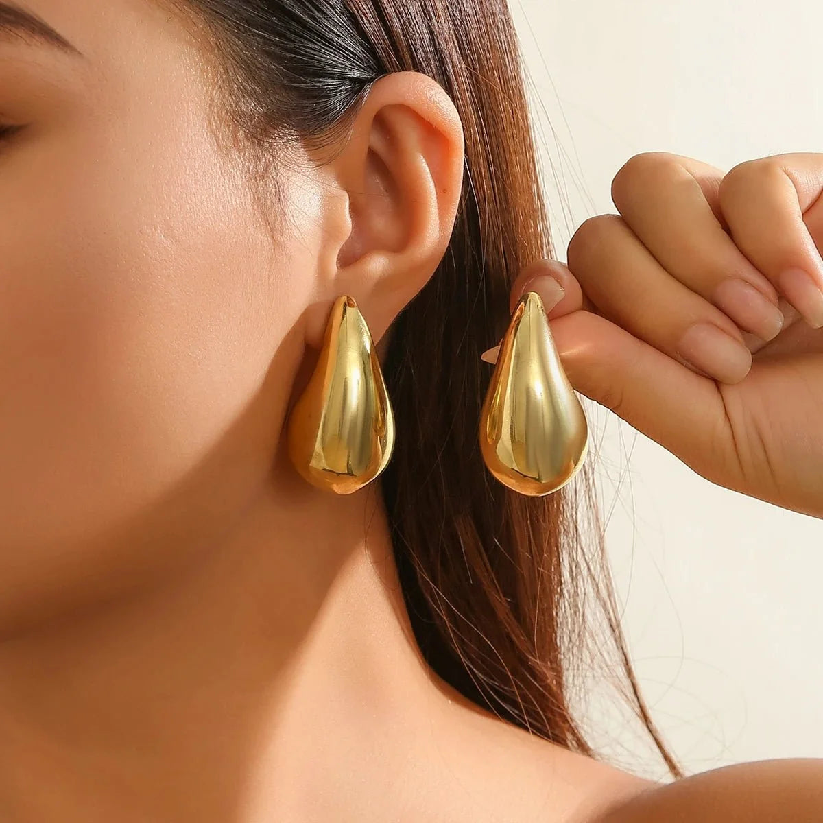 Statement Water Drop Earrings in gold