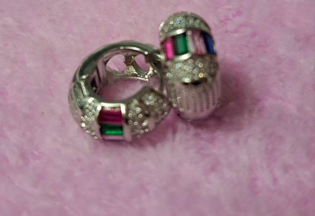 Bold Baguette Scattered Diamond Hoop Earrings worn by a customer