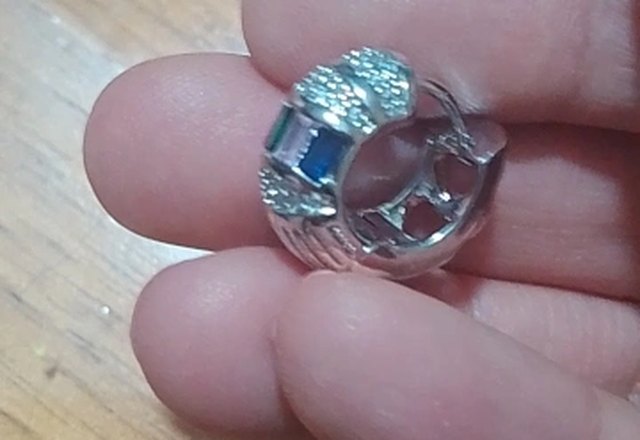Bold Baguette Scattered Diamond Hoop Earrings worn by a customer