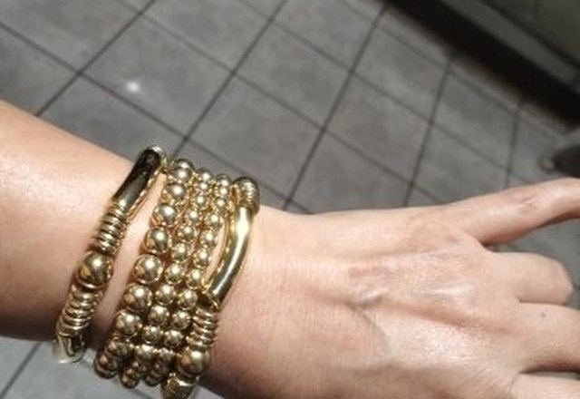 5pc Beaded Bracelet Stack Set worn by a customer