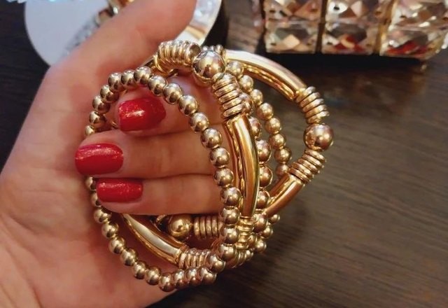 5pc Beaded Bracelet Stack Set worn by a customer