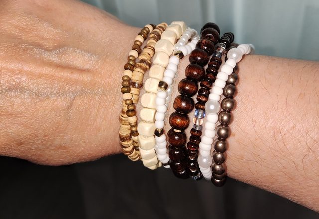 10pc Adjustable Boho Bracelet Variety Set worn by a customer