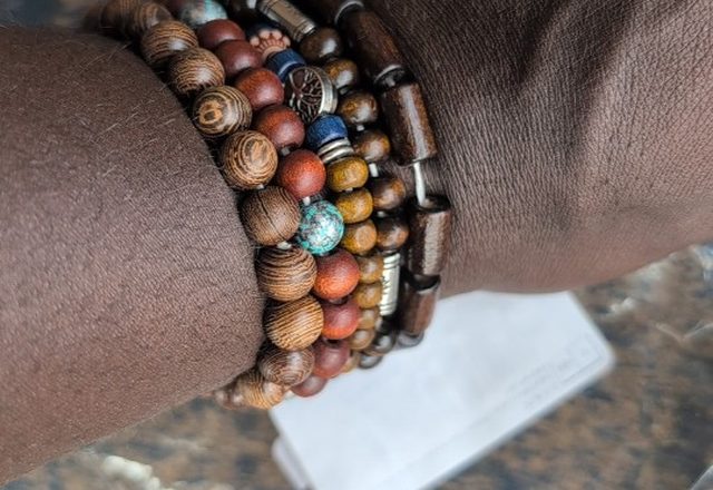 10pc Adjustable Boho Bracelet Variety Set worn by a customer