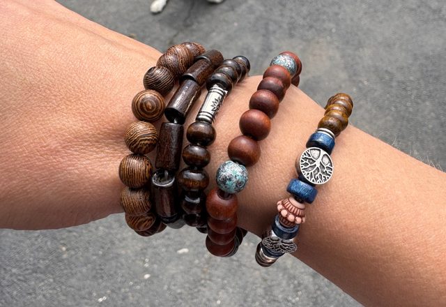 10pc Adjustable Boho Bracelet Variety Set worn by a customer