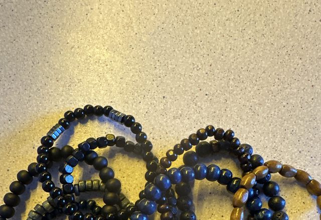 10pc Adjustable Boho Bracelet Variety Set worn by a customer