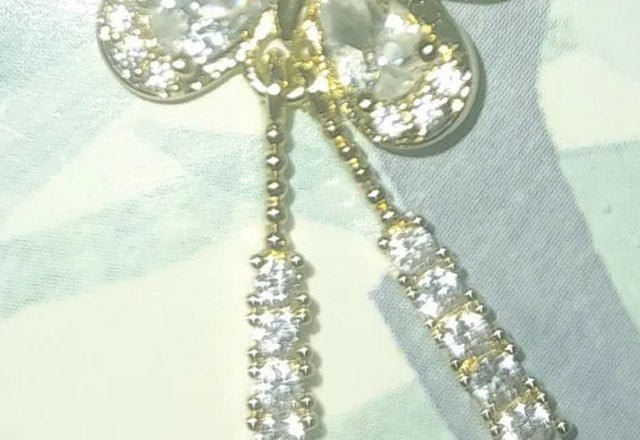 Charming Butterfly Diamond Dazzle Necklace worn by a customer
