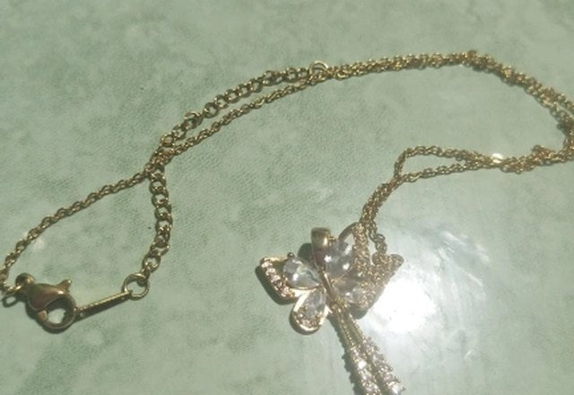 Charming Butterfly Diamond Dazzle Necklace worn by a customer