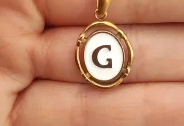 Accented Initial Chain Charm Necklace worn by a customer