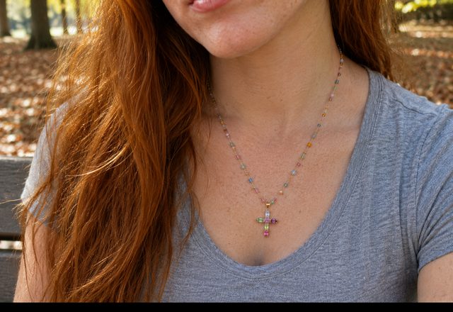 Dainty Colorful Gem Set Cross Necklace worn by a customer