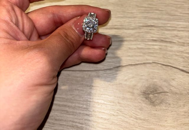 Square Halo Baguette Band Ring worn by a customer