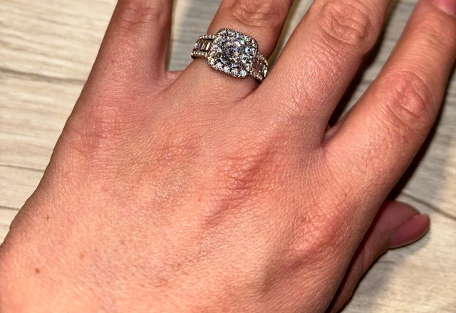 Square Halo Baguette Band Ring worn by a customer