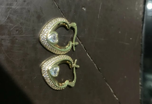 Glamorous Diamond Heart Earrings worn by a customer