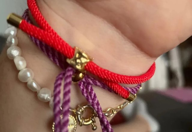 Adjustable Heart Letter Initial Bracelets worn by a customer