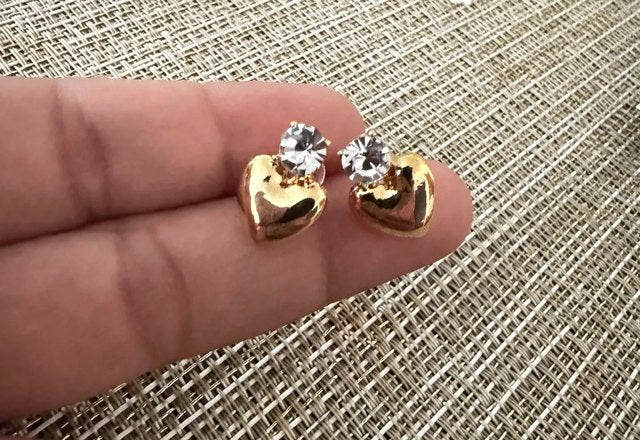 Dainty Diamond Heart Stud Earrings worn by a customer