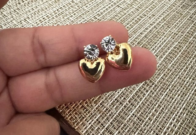Dainty Diamond Heart Stud Earrings worn by a customer