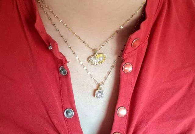 Iconic Dainty Necklace Collection worn by a customer