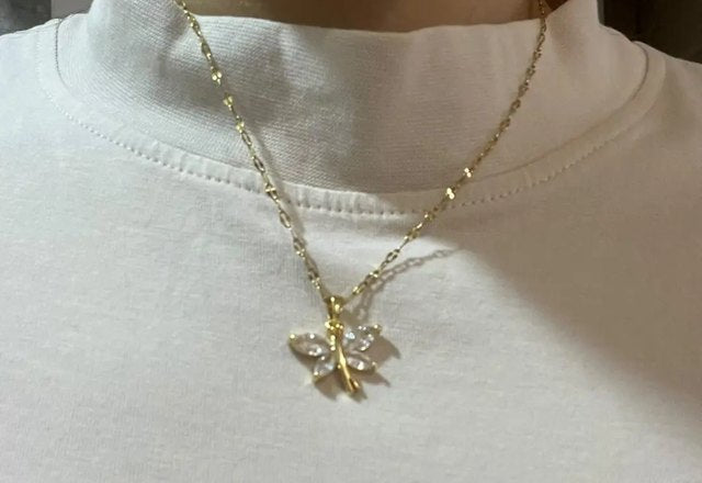 Iconic Dainty Necklace Collection worn by a customer
