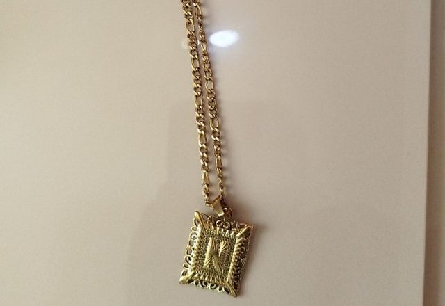 2pc 14k Initial & Cross Necklace Set worn by a customer