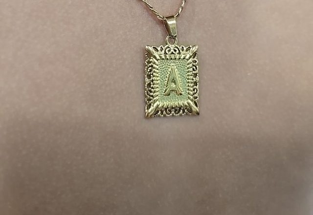 2pc 14k Initial & Cross Necklace Set worn by a customer