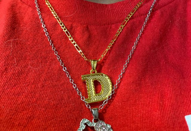 2pc 14k Initial & Cross Necklace Set worn by a customer