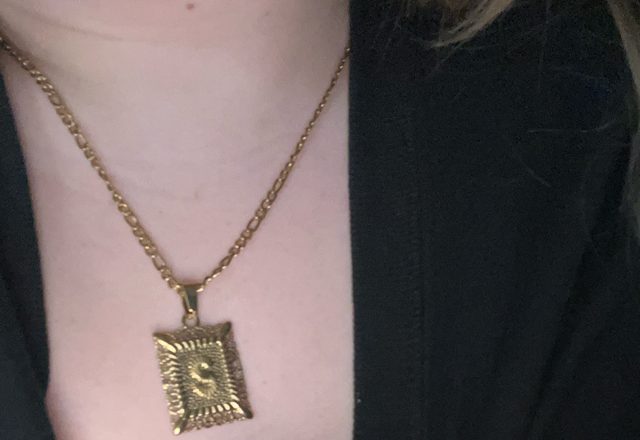 2pc 14k Initial & Cross Necklace Set worn by a customer
